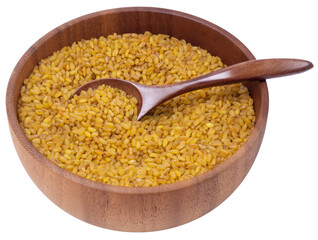 Isolated Bulgur in a wooden bowl with a spoon on a white background