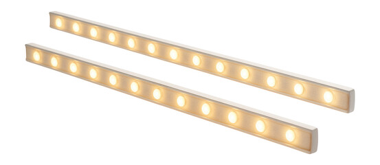 Obraz premium Bright LED strip lights for enhancing shelf illumination in a contemporary home library.