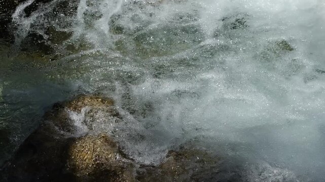 Water flowing through rocky rapids in Mostnica gorge, Bohinj valley, Triglav National Park, Slovenia. 4K.