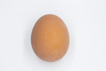 close-up of a boiled whole egg on a white background