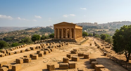 Ancient temple ruins under a blue sky, surrounded by a vast, arid landscape