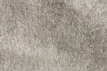 Soft heather knit in warm gray‑taupe with white specks, seamless textile texture, cozy winter fabric background in high resolution for design and print. Photo