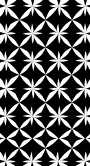 Fototapeta premium Vertical black and white floral pattern with repeating flower shapes