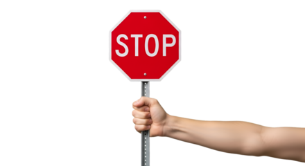 Hand Holding a Red Stop Sign Against a Black Background