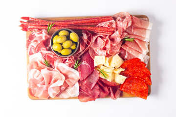 Charcuterie board. Antipasti appetizers of meat and cheese platter with salami, prosciutto crudo or jamon and olives