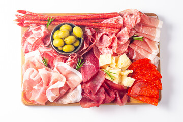 Charcuterie board. Antipasti appetizers of meat and cheese platter with salami, prosciutto crudo or jamon and olives