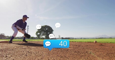 Fielding teenage player in blue uniform on infield, with glove catching ball under bright sunlight