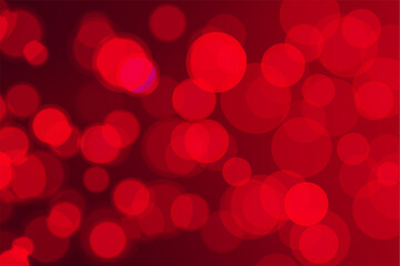 Warm red gradient with bokeh. red blurred background with blurred light sparkles and bokeh. Perfect for holiday illustrations or elegant backgrounds. Vector illustration.