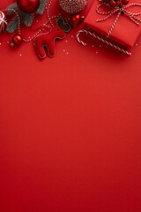Vertical holiday scene with red background featuring gift wrap ornaments candy canes and festive...