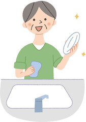 皿洗いをするシニア女性