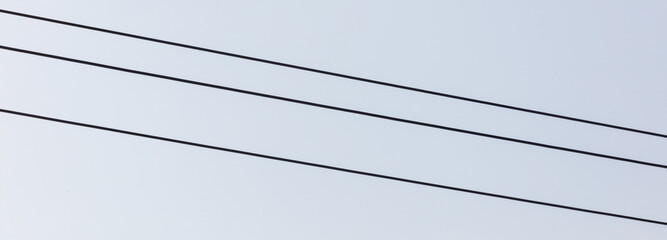Two power lines are shown in the image