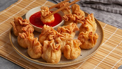 Wontons with cashew and carrot filling