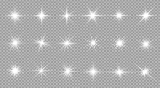Glowing white stars with shimmering rays and lens flare effects. Great for Christmas designs and magical illustrations. Transparent background format.