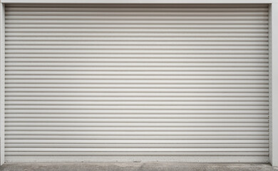 Obraz premium Metal sheet roller shutter gate of the garage house or factory warehouse during it closed. Building place and object, close-up.