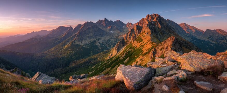 Majestic mountain range at sunrise with stunning landscape and vibrant colors
