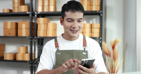 A confident online entrepreneur managing customer orders and digital marketing for his e-commerce business, symbolizing innovation, technology, and customer service excellence in modern trade.