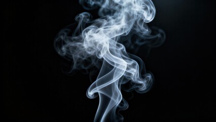 Wispy white vapor curls upward against a deep black background