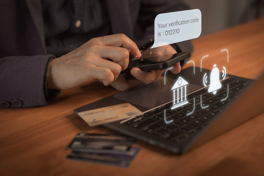 Person using smartphone for online banking with verification code notification, representing digital security, financial technology, and secure payment transaction in modern fintech concept.