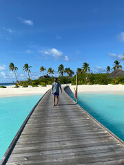 man walking on the beach