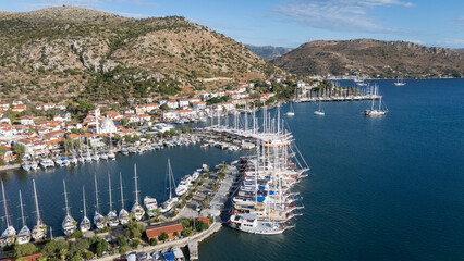 Fototapeta premium Aerial View of Bozburun Harbor and Sailboats in Marmaris, Turkey