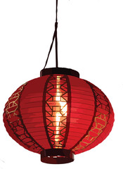 Vibrant red chinese lantern illuminates with warm golden glow and shadow play