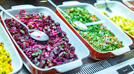 Levantine vegetable salads displayed in a restaurant