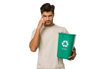 Young caucasian man holding a glass trash isolated pointing temple with finger, thinking, focused on a task.
