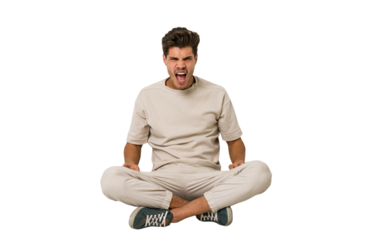 Young caucasian man sitting on the floor isolated on white background shouting very angry, rage concept, frustrated. - Powered by Adobe