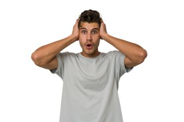 Young handsome caucasian man isolated on white background being shocked, she has remembered important meeting.