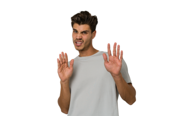 Young handsome caucasian man isolated on white background rejecting someone showing a gesture of disgust.