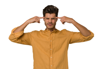 Young handsome caucasian man isolated on white background focused on a task, keeping forefingers pointing head.