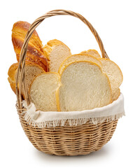 Assorted bread in a wicker basket isolated on white background with clipping path. Freshly baked loaves and sliced bread arranged beautifully for bakery or breakfast concept