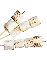 Three marshmallows are skewered on sticks