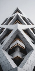 Obraz premium Modern Geometric Architecture Facade with Angular Concrete Shapes and Warm Lights