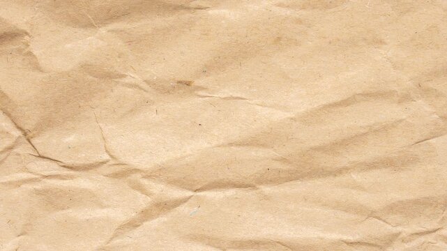 Abstract crumpled and creased recycle brown paper texture background stop motion