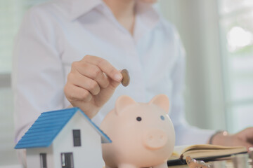 Real estate agents discuss real estate investment and mortgage plans, and provide financial advice...