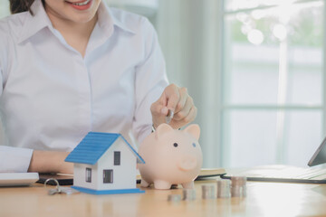 Real estate agents discuss real estate investment and mortgage plans, and provide financial advice...