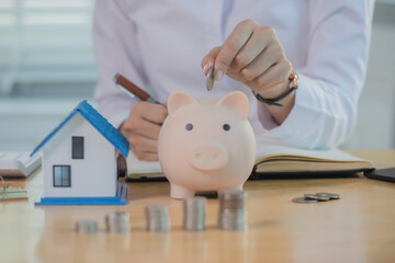 Real estate agents discuss real estate investment and mortgage plans, and provide financial advice...