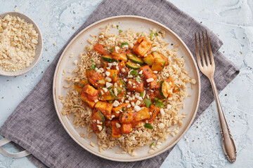 Tofu with chili peanut sauce