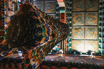 Intricate details of Tibetan Buddhist temple interior. Colorful paintings, sculptures, and sacred ornaments symbolizing devotion and Himalayan art heritage