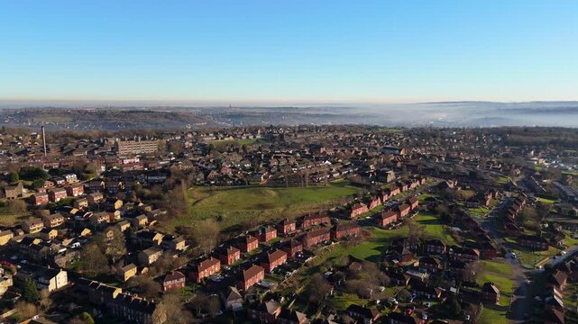 Urban housing in Yorkshire UK. Council houses on town estate, winter morning in a busy city. Dewsbury moor and th town of Heckmondwike
