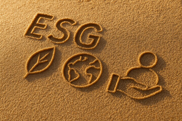 ESG reporting standards concept with environmental and social responsibility icons carved in sand symbolizing sustainability and ethical governance for corporate accountability and transparency