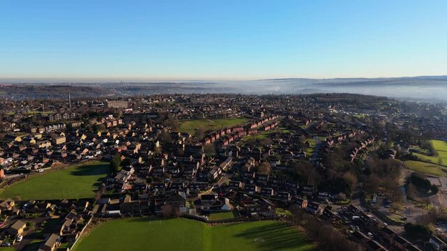 Urban housing in Yorkshire UK. Council houses on town estate, winter morning in a busy city. Dewsbury moor and th town of Heckmondwike