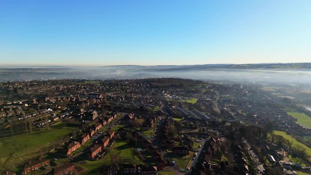 Urban housing in Yorkshire UK. Council houses on town estate, winter morning in a busy city. Dewsbury moor and th town of Heckmondwike
