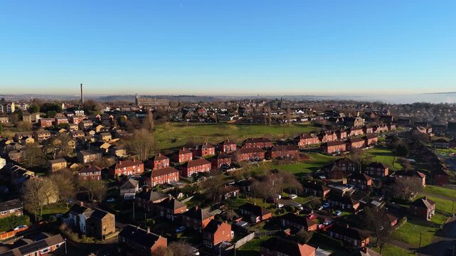 Urban housing in Yorkshire UK. Council houses on town estate, winter morning in a busy city. Dewsbury moor and th town of Heckmondwike