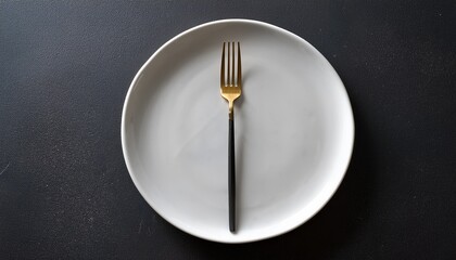Fork And White Plate On Dark Surface Minimalistic Design Elegant Dining Setup For Modern Kitchens