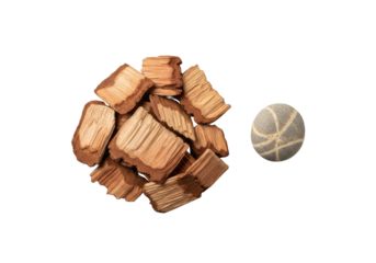 Natural wood chips with intricate grain and a smooth river stone, flat lay on transparent background, highlighting organic simplicity and minimalist beauty concept
