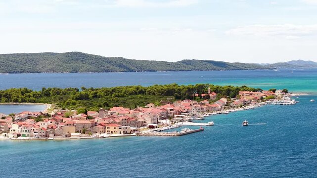 Adriatic Island Life: Panoramic View of Krapanj, Croatia's Smallest Inhabited Island, Highlighting its Unique Charm, Secluded Coves, and the Seamless Blend of Nature and Coastal Living