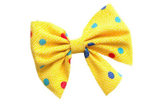Yellow polka dot bow tie isolated on transparent background. Colorful dotted yellow bow isolated on white background.