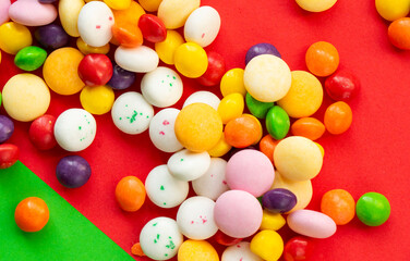 Candy on the red background